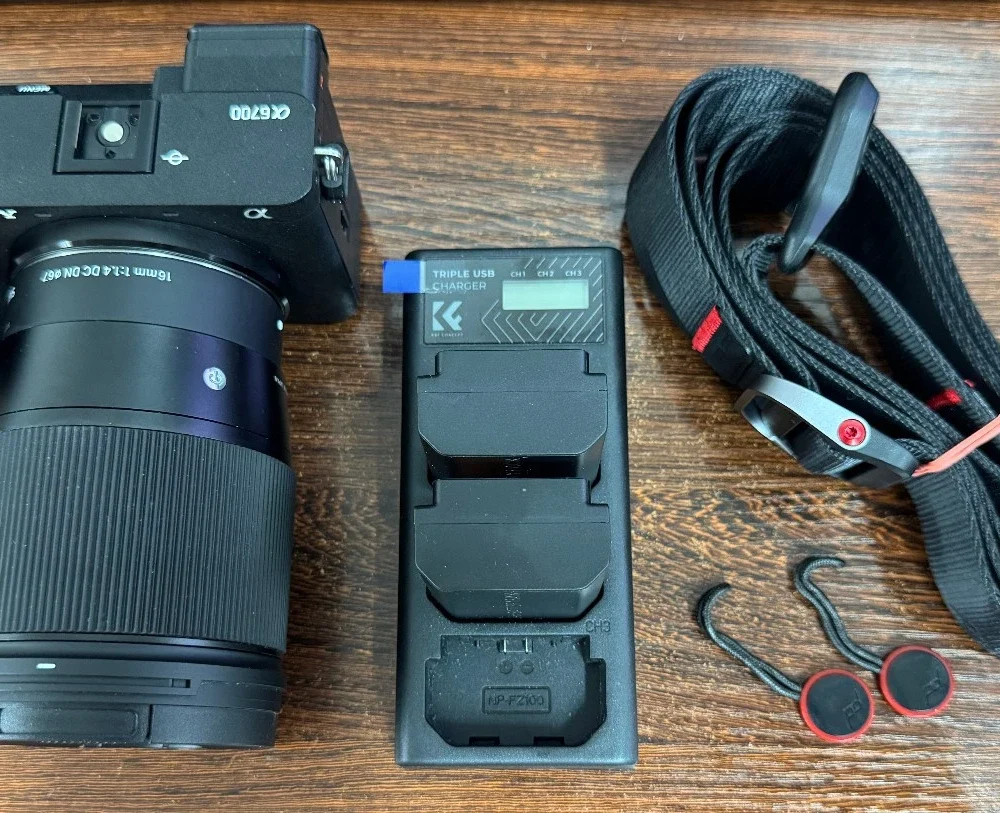 Sony Alpha 6700 26 MP APS-C Mirrorless Camera + Sigma 16mm + 3 Batteries + Strap